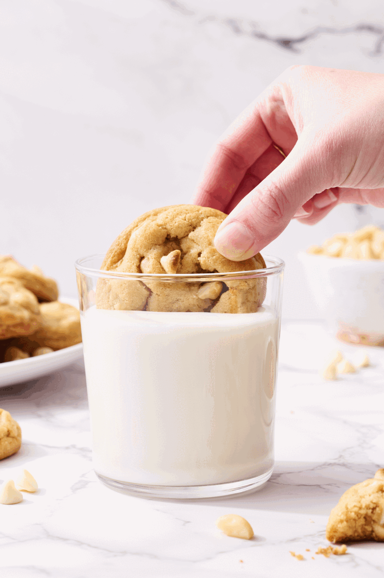gif dunking a cookie in milk.