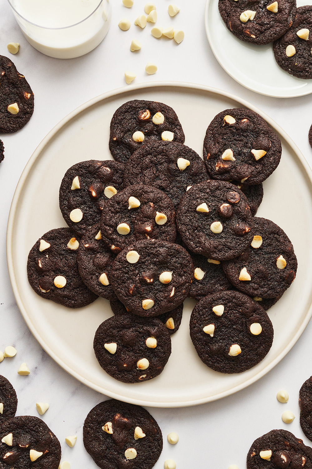 black and white chocolate chipper cookies on a plate