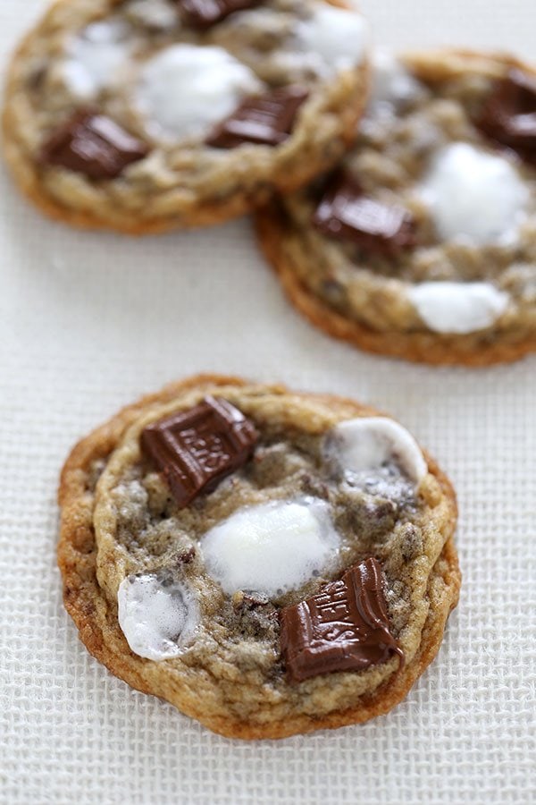 several freshly-baked s'mores cookies, with gooey marshmallows and melty chocolate 