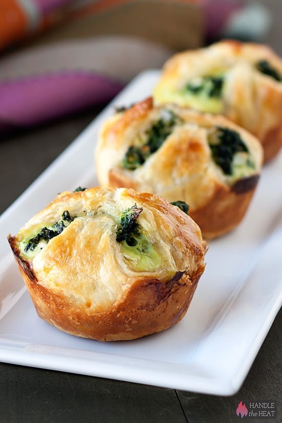 Spinach Puffs - stuffed with a cheesy spinach filling and enclosed in a buttery puff pastry crust.