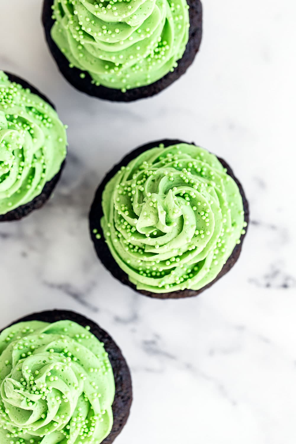 Chocolate mint cupcakes on a marble counter