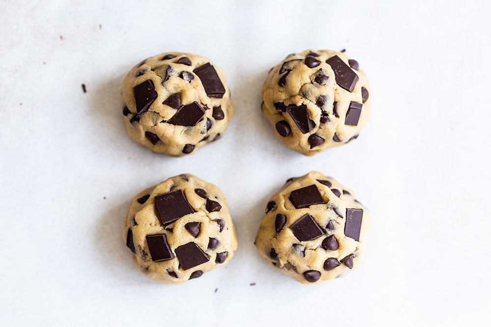 Balls of big and thick chocolate chip cookie dough
