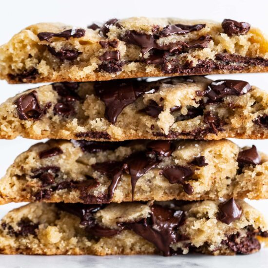 Stack of gooey giant chocolate chip cookies