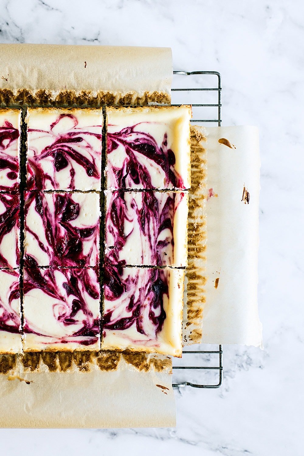 Cranberry Swirl Cheesecake Bars are tangy, sweet, fresh, and rich. They look almost as good as they taste!