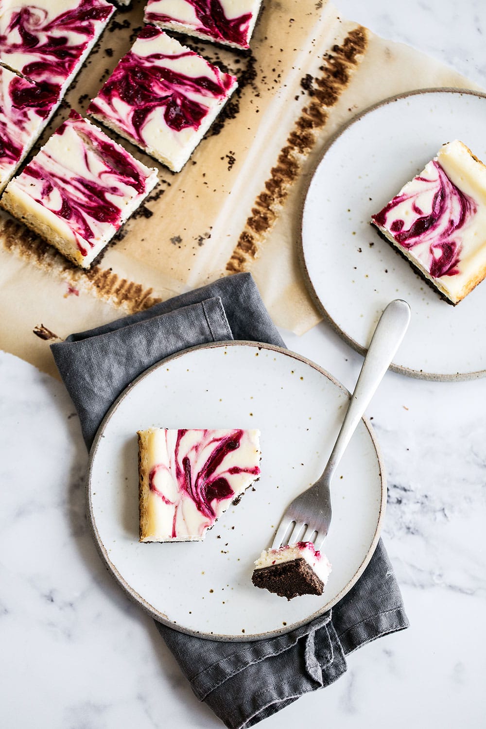 Cranberry vanilla cheesecake with a chocolate cookie crust
