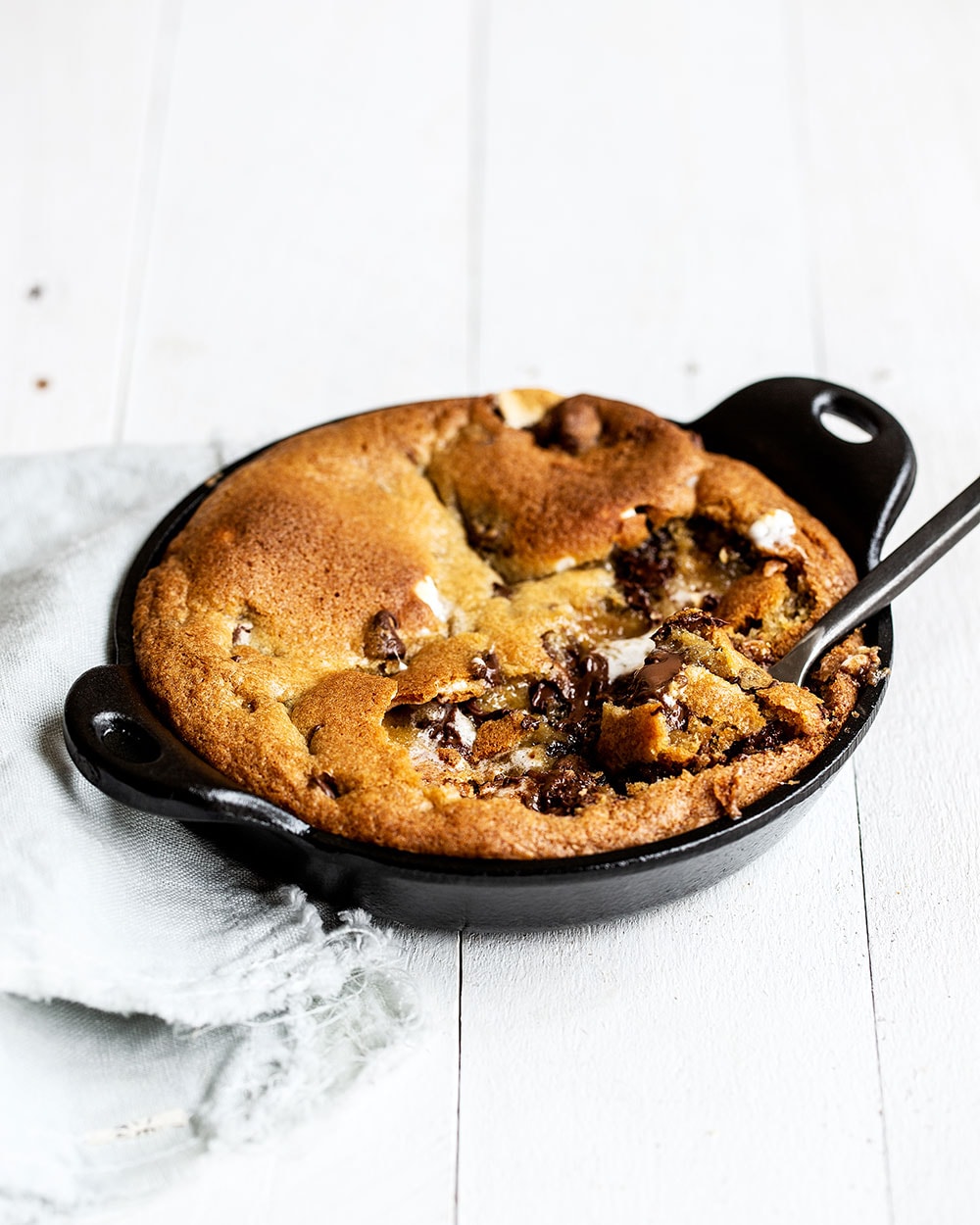 S'mores skillet cookie with spoonful taken out