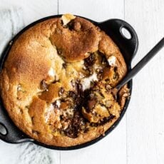 Gooey pizookie stuffed with marshmallow, Hershey's bars, and graham cracker bits