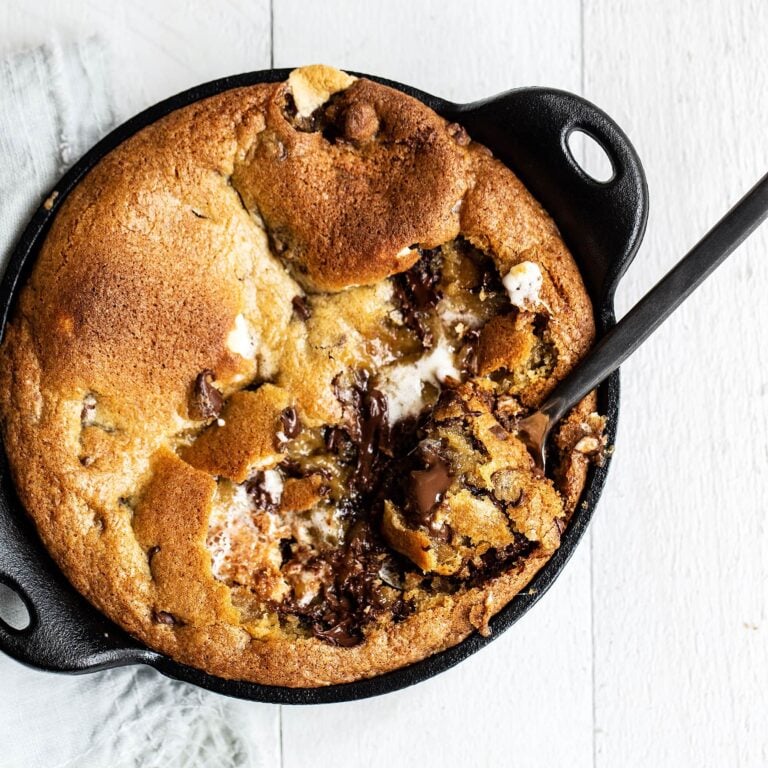 Gooey pizookie stuffed with marshmallow, Hershey's bars, and graham cracker bits