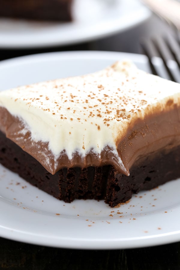 Chocolate Cream Pie Brownies have a rich fudgy brownie bottom, a layer of luscious chocolate cream pie filling, and are topped with homemade whipped cream.