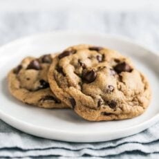 Soft Chocolate Chip Cookies are ultra ooey and gooey with two secret ingredients to keep them ultra soft and tender! Your friends will LOVE these cookies.