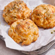 homemade red lobster cheesy garlic biscuits on a baking sheet