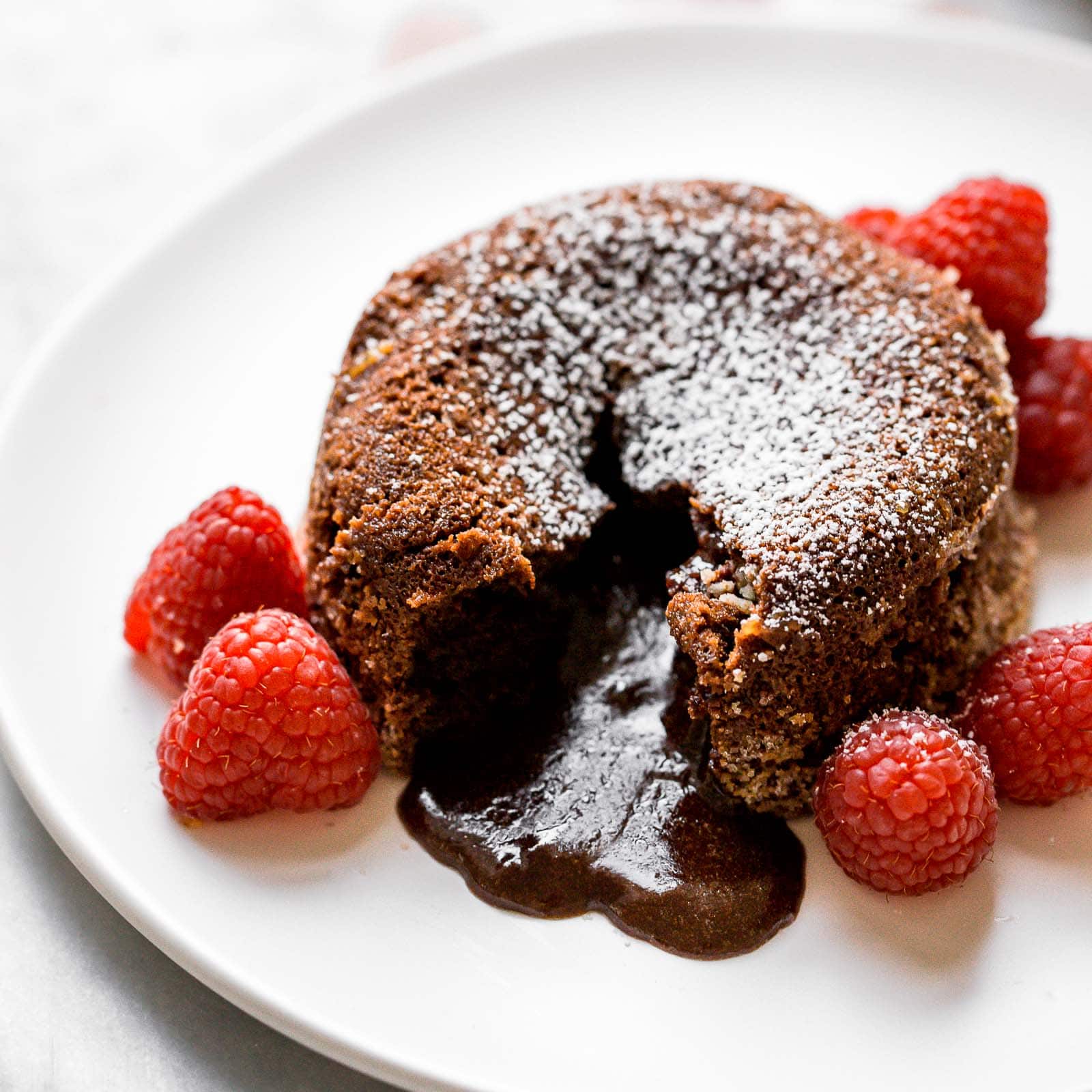 Molten lava chocolate filling oozing out of these chocolate cakes!