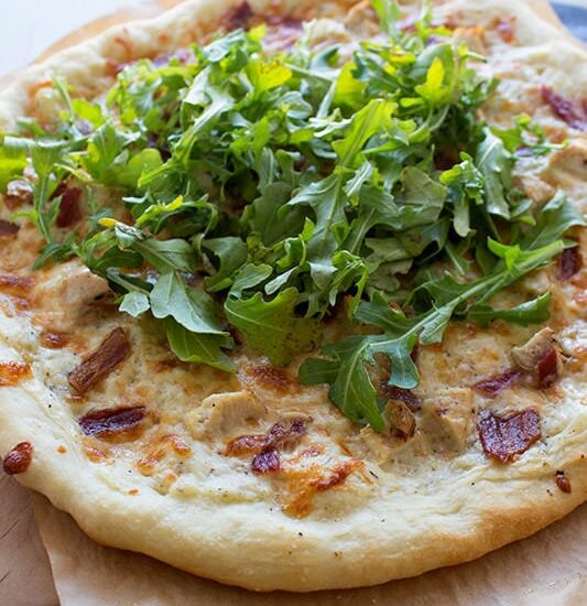 The BEST White Pizza with bacon and arugula!