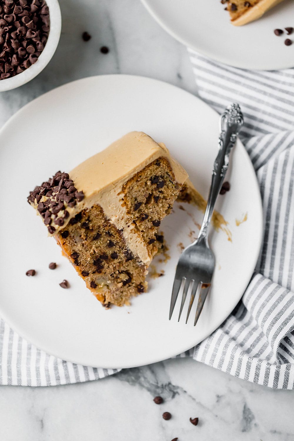 Bursting with sweet flavors, Banana Chocolate Chip Cake with Peanut Butter Frosting is a huge crowd-pleaser and better than any store-bought cake. Love!