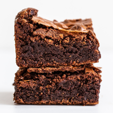 the most decadent, fudgy brownies you'll ever have, stacked two high