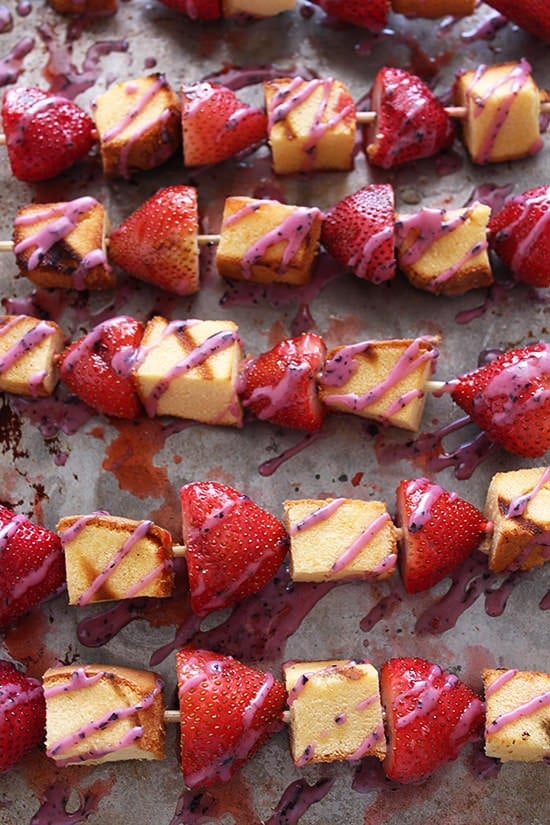 Grilled Strawberry Shortcake Skewers with Blueberry Glaze are the perfect colorful, fresh and festive Fourth of July recipe! #partner