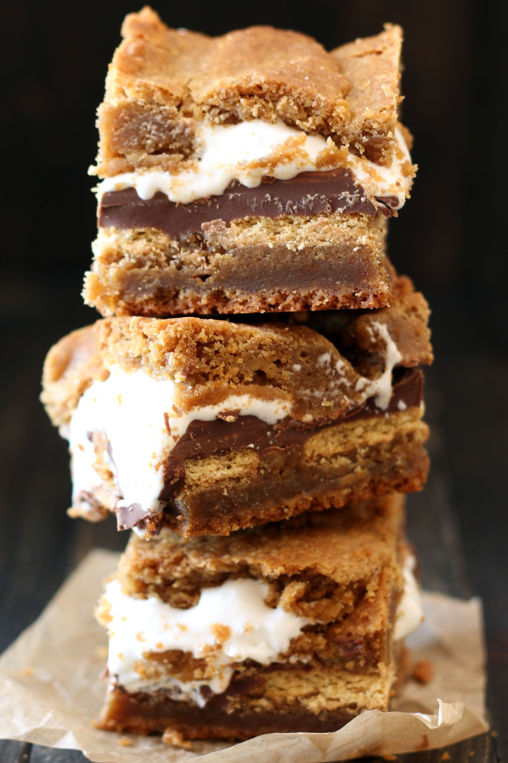 a stack of three gooey, delicious peanut butter s'mores blondies