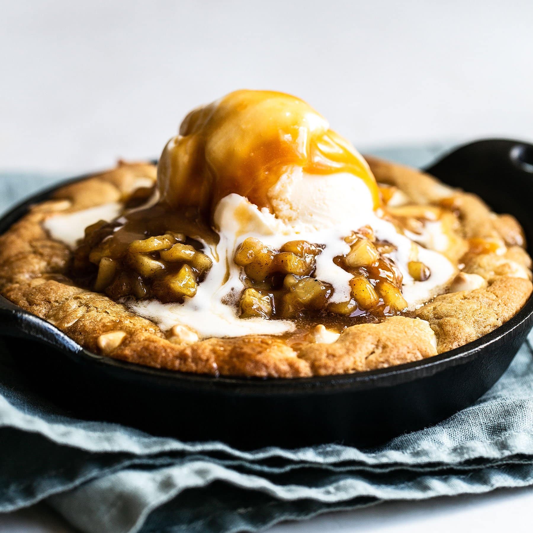 Salted Caramel Apple Pie Pizookies with vanilla ice cream