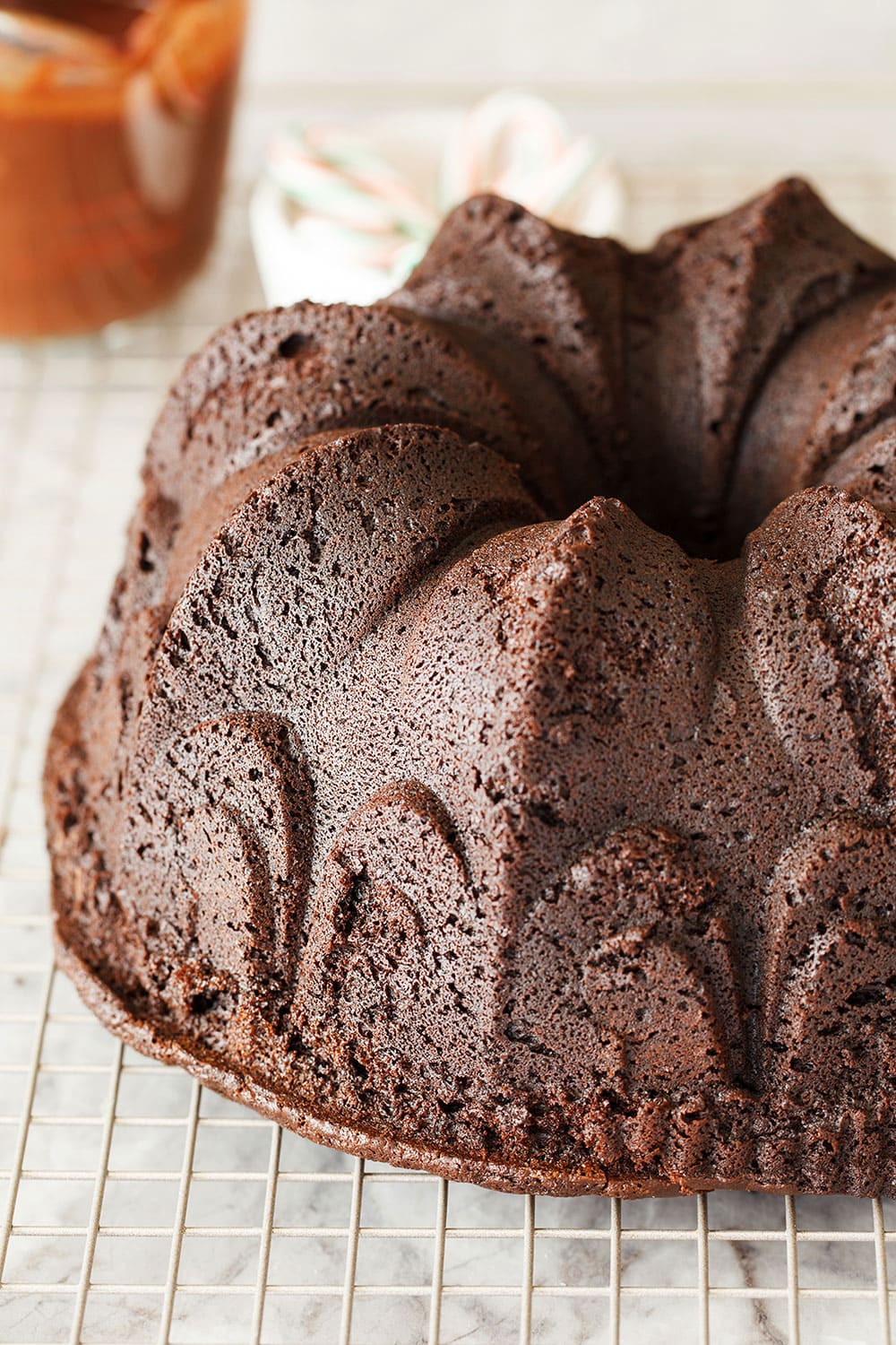 Peppermint Mocha Bundt Cake is the absolute PERFECT holiday cake! It's as easy as it is beautiful and loaded with chocolate, coffee, and peppermint flavors.