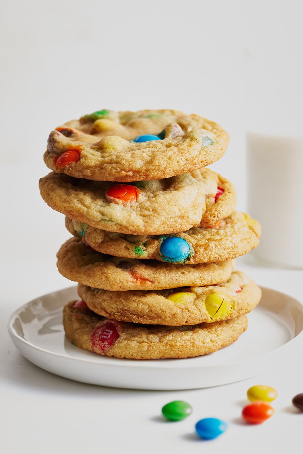 a stack of beautiful soft and chewy M&M cookies