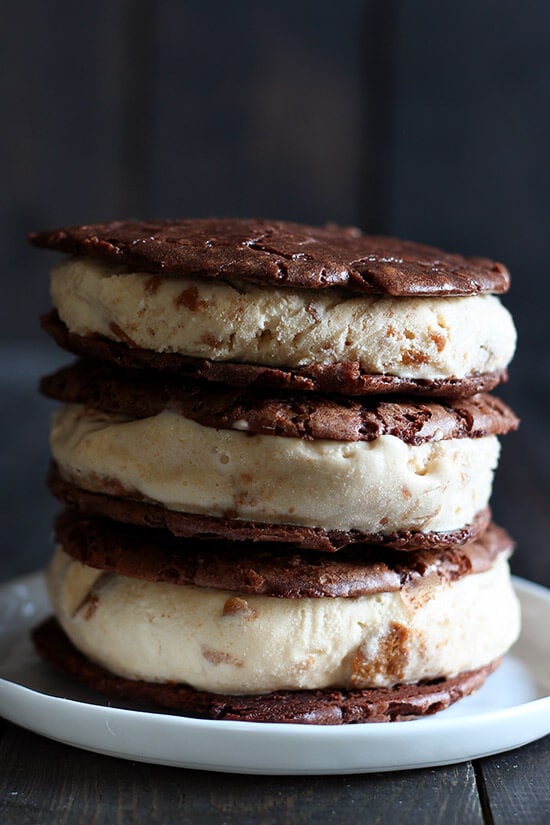 Cookie Butter Brownie Ice Cream Sandwiches have thin yet ultra chocolaty and chewy brownie cookies sandwiching a layer of homemade cookie butter ice cream! Ridiculously good!