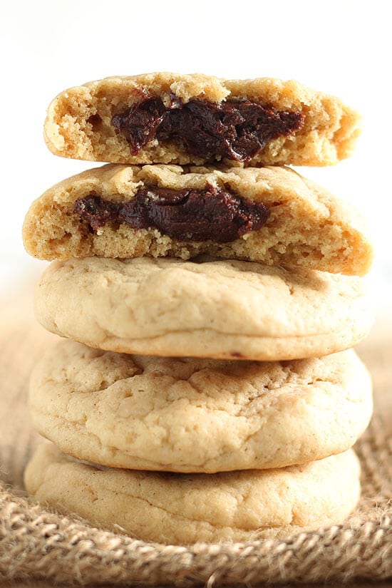 Fudge Filled Cookies are ultra soft and tender brown sugar cream cheese cookies with a secret rich chocolate fudge filling inside. As tasty as they are fun - love this recipe!