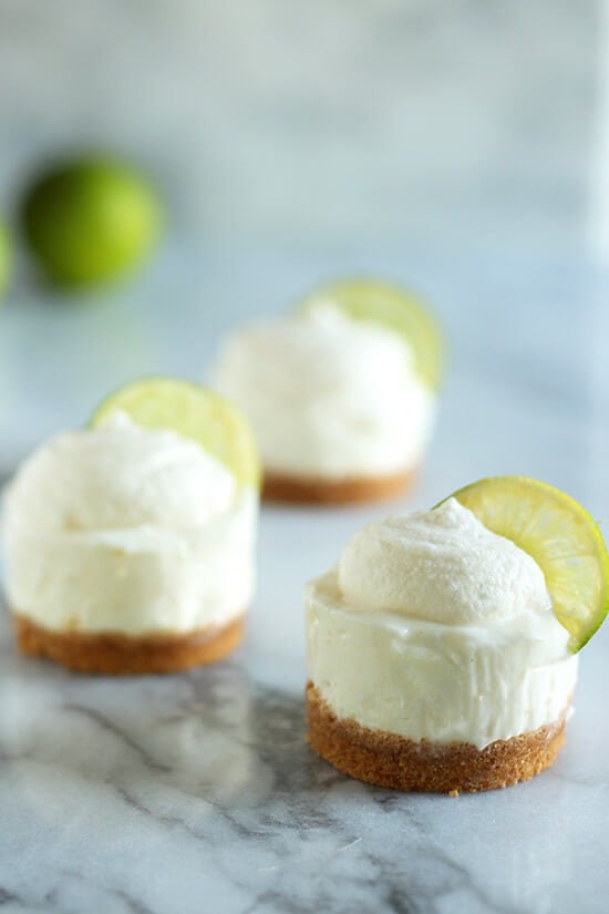 No Bake Mini Key Lime Cheesecakes are perfectly refreshing and keep your house cool without even turning on the oven OR stove! Fresh and adorably miniature, what's not to love?