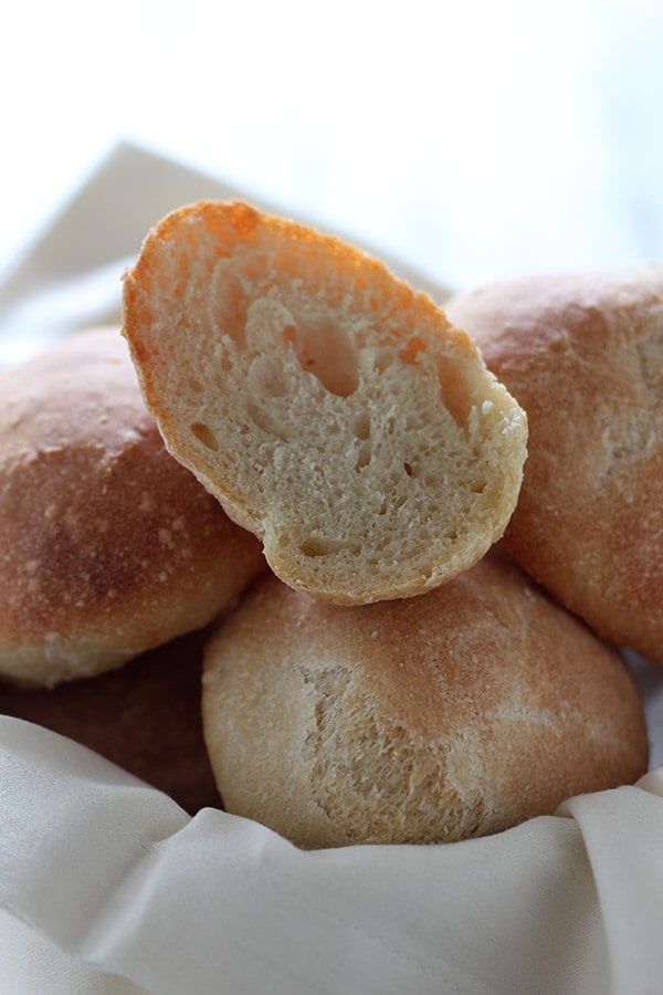 Scratch-made no-knead crusty bread rolls take just 5 minutes to prep and taste just as good as any bakery or restaurant-quality bread! Can be made ahead too!