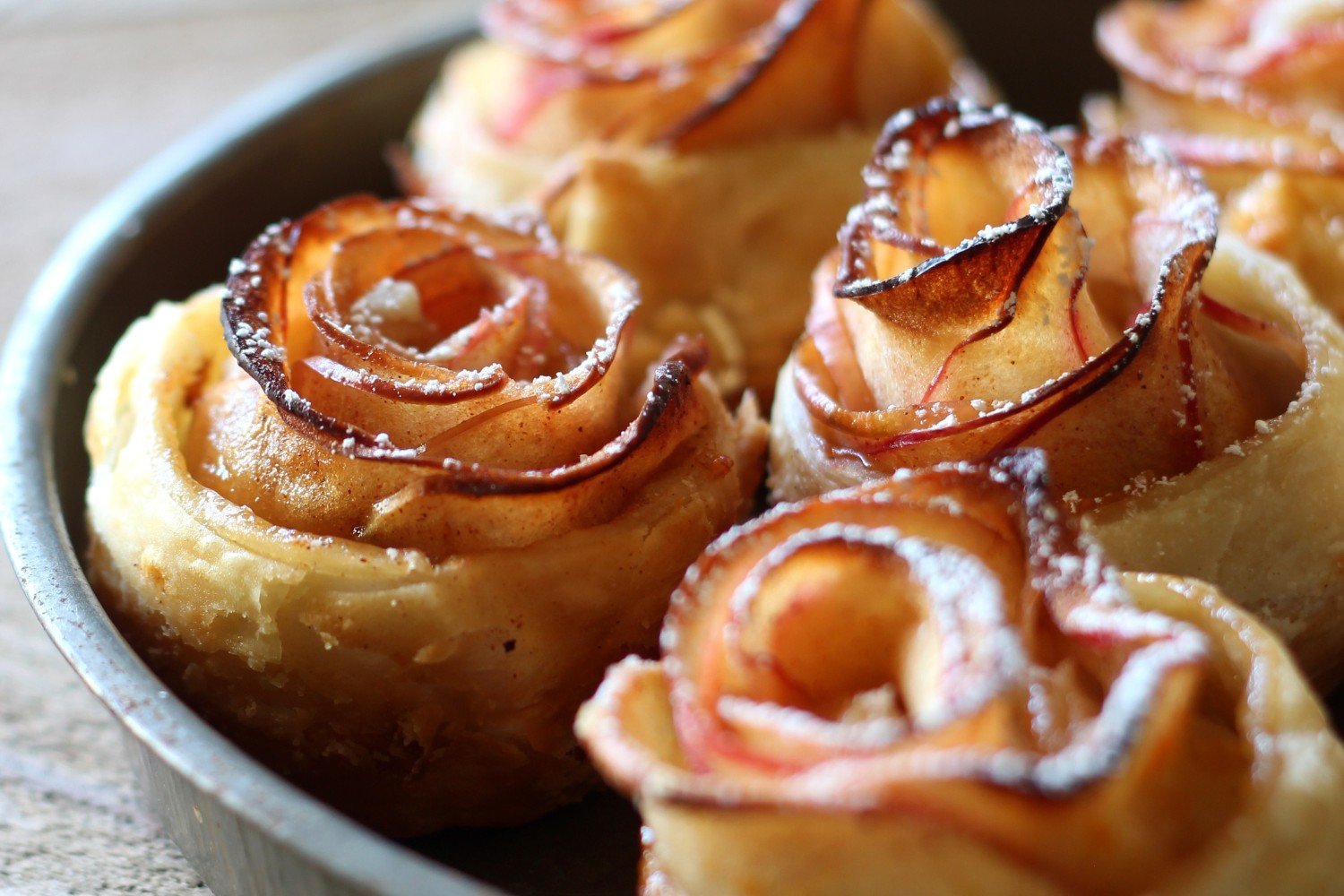 pretty apple roses in a round baking pan.