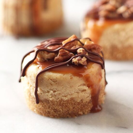 These lasted 2 MINUTES! Everyone loved them. Mini Turtle Cheesecakes feature a thick graham cracker crust, vanilla cheesecake filling, and are topped with caramel, toasted pecans, and chocolate!