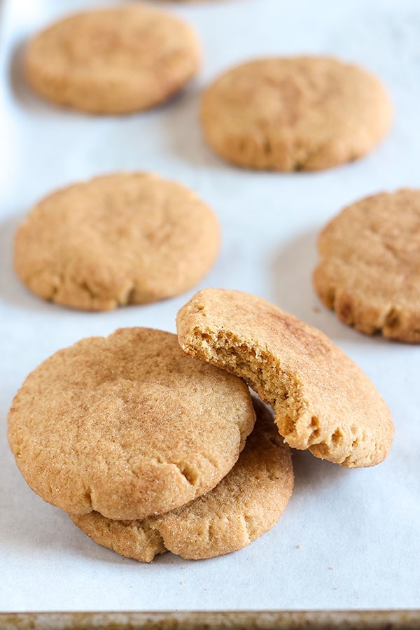 Peanut Butter Snickerdoodles are ultra soft with a dose of nutty peanut butter and a crunchy cinnamon sugar coating. Your house will smell WONDERFUL while these are baking! Mmm mmm.