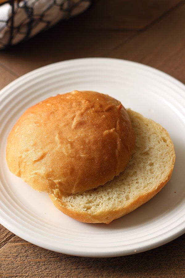 one Potato Burger Bun on a white plate before serving.