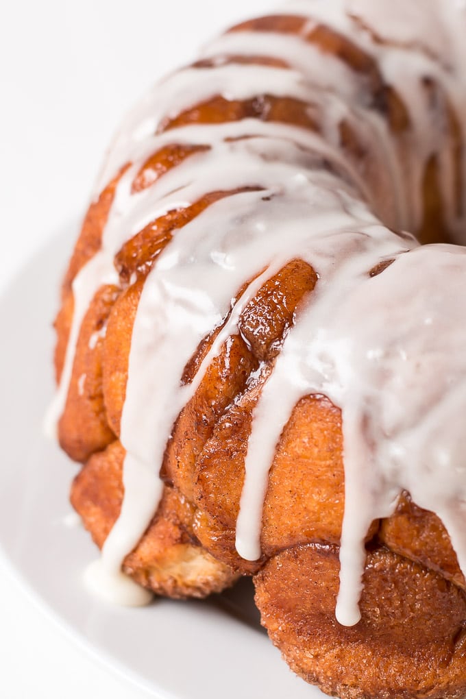 Buttery, cinnamon and sugar coated balls of dough, covered in a sweet creamy glaze... this Monkey Bread is irresistible!