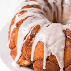Buttery, cinnamon and sugar coated balls of dough, covered in a sweet creamy glaze... this Monkey Bread is irresistible!