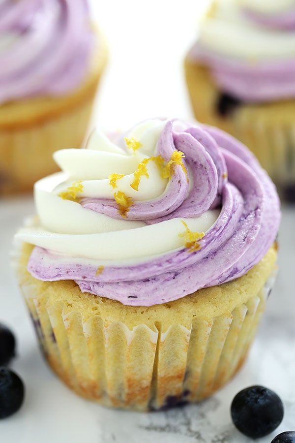 Lemon Blueberry Cupcakes are perfectly tender and moist with tons of fresh lemon and blueberry flavors, plus an easy swirled buttercream for a gourmet look that will impress everyone!