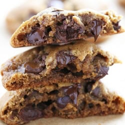 a stack of cookies Butterscotch Browned Butter Chocolate Chip Cookies broken in half.