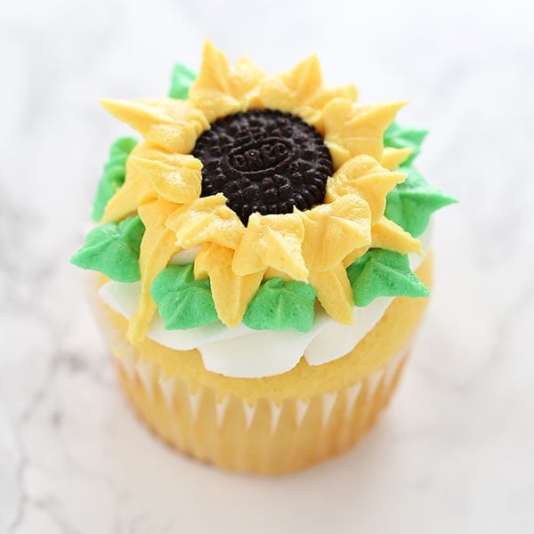 How to Make Sunflower Cupcakes with three different buttercream decorating methods that anyone can do! They're so fun, happy, and beautiful that everyone will think they came from an expensive bakery!