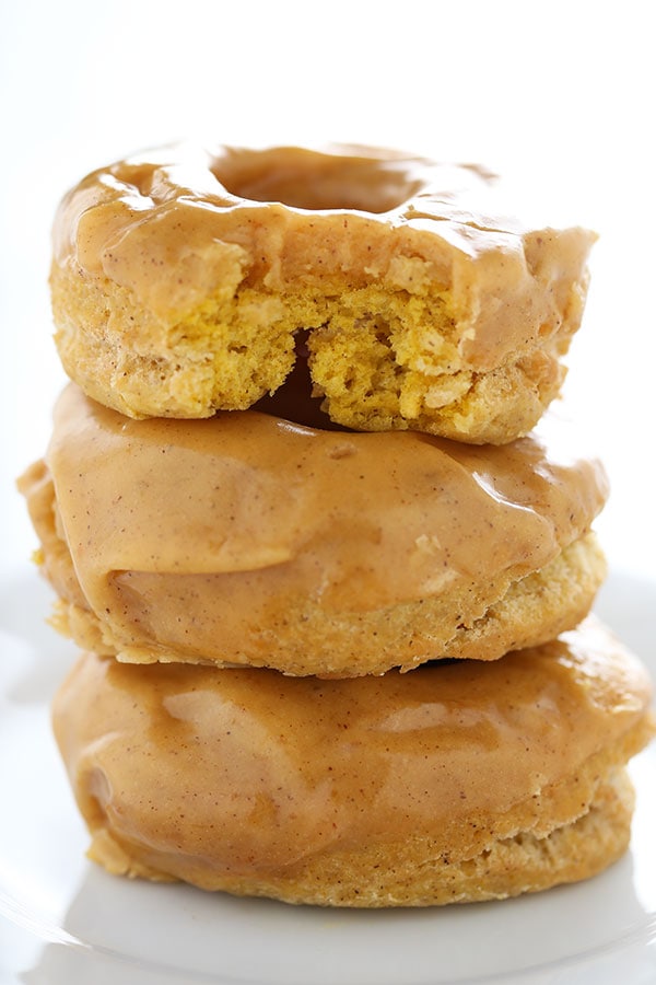 Pumpkin Old Fashioned Doughnuts are fried to perfection and loaded with pumpkin spice flavors and a thick shiny pumpkin glaze. No yeast makes this recipe quick and easy!