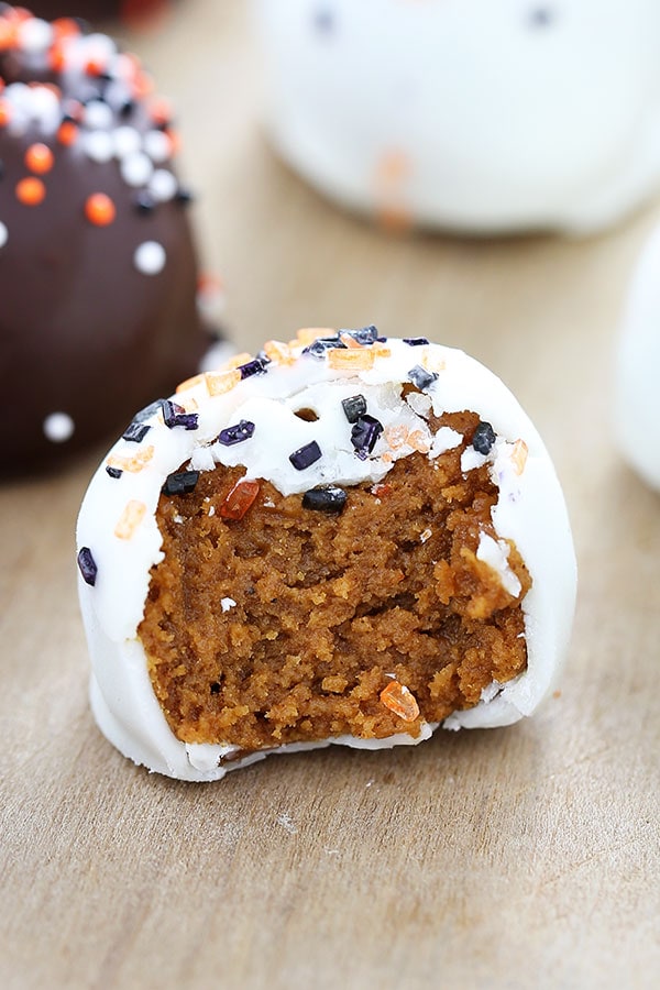 Pumpkin Cookie Butter Truffles are filled with cream cheese, pumpkin, Speculoos cookies, and tons of warm spices then dipped in chocolate. Fall perfection! No baking or chocolate tempering required!