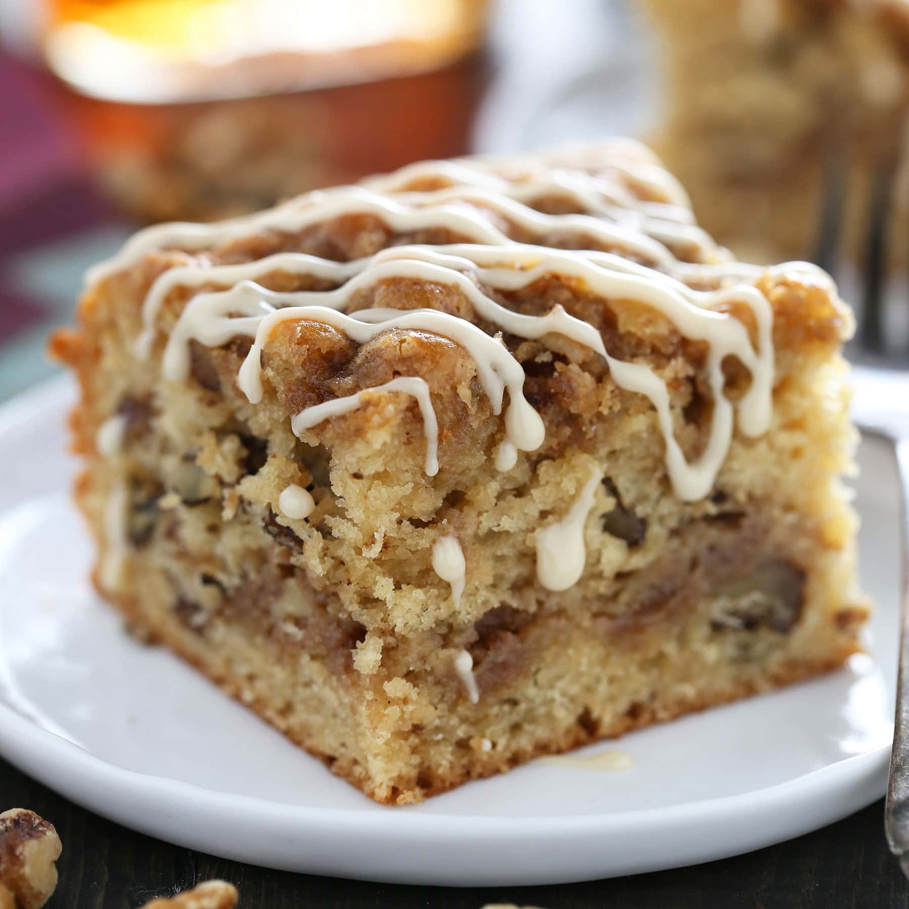Maple Walnut Coffee Cake is perfectly moist, light, and fluffy while bursting with fall-inspired flavors. Quick and easy recipe, no mixer required!