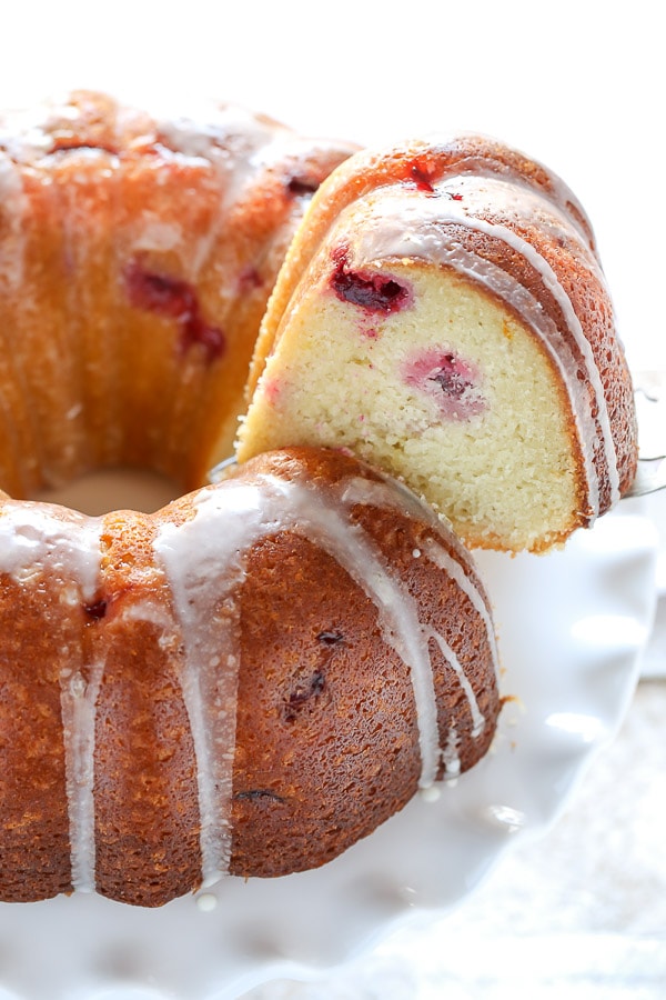 This Cranberry Orange Bundt cake features a soft and delicious cake with hints of orange and juicy cranberries in every bite!