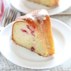 This Cranberry Orange Bundt cake features a soft and delicious cake with hints of orange and juicy cranberries in every bite!