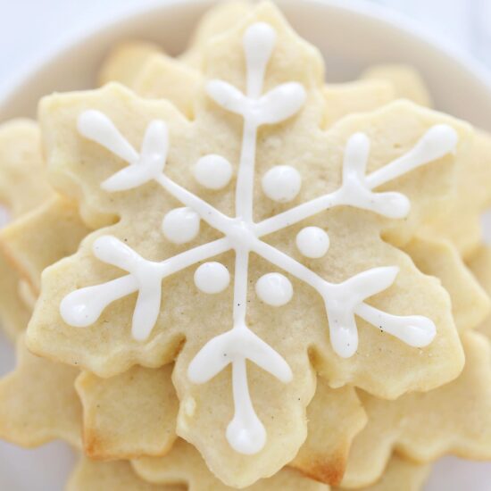 How to make EASY snowflake sugar cookies with a bunch of baking hacks to save you time! Step-by-step video included too!