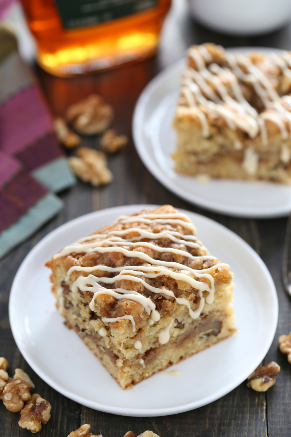 slices of maple coffee cake with simple white maple icing drizzled on top