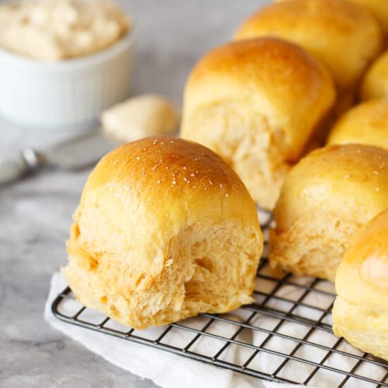 Sweet Potato Dinner Rolls are ridiculously soft and fluffy with a slightly crisp and chewy crust and a hint of sweet potato goodness.