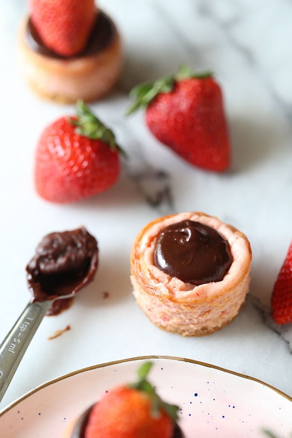 Chocolate Strawberry Mini Cheesecakes are perfectly easy, adorable, and transportable for the perfect Valentine’s Day dessert. Plus they can be made ahead of time!