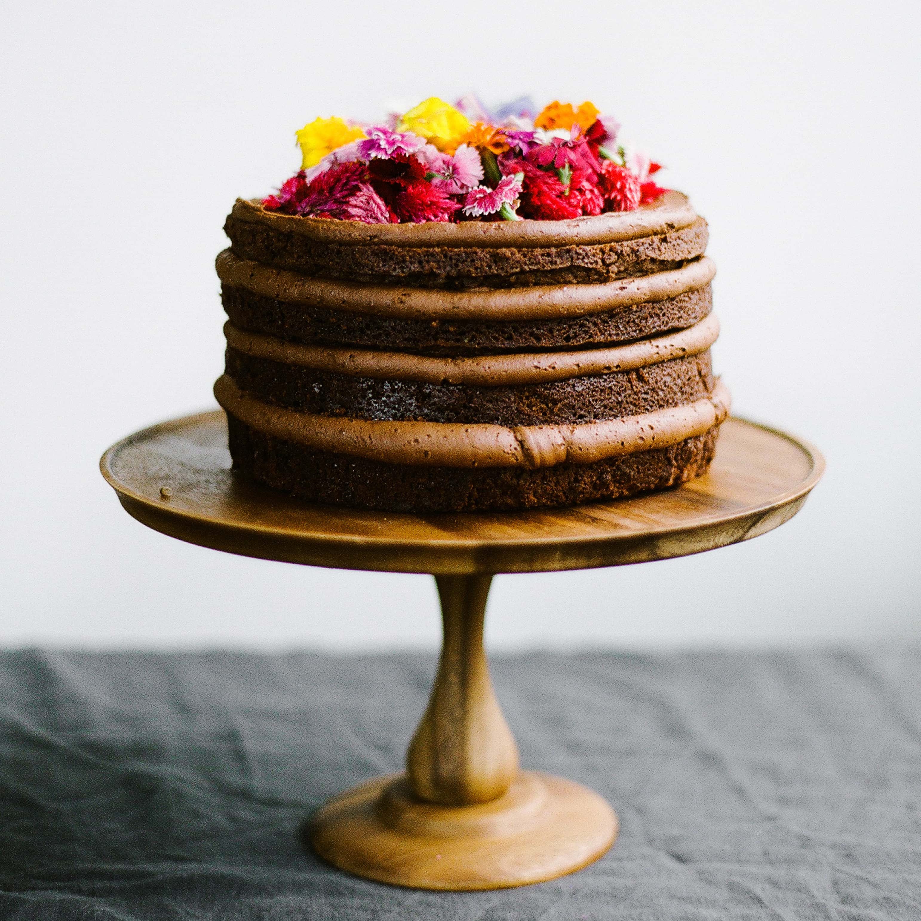 Nutella Chocolate Cake topped with beautiful spring flowers