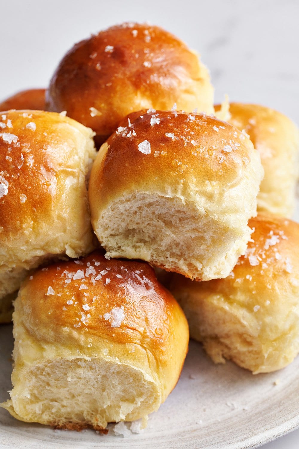 soft and fluffy yeast rolls with flakes of salt