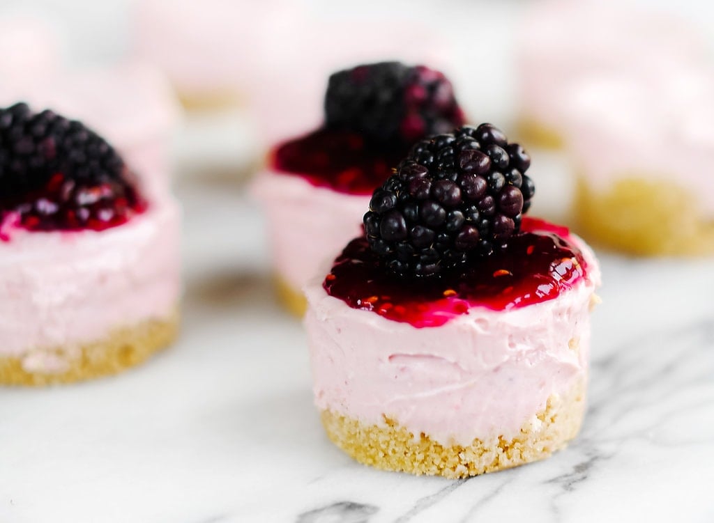 Adorable No Bake Mini Blackberry Cheesecakes are ultra fresh, vibrant, and simple to make with no oven or stove required! Perfect for spring or summer.