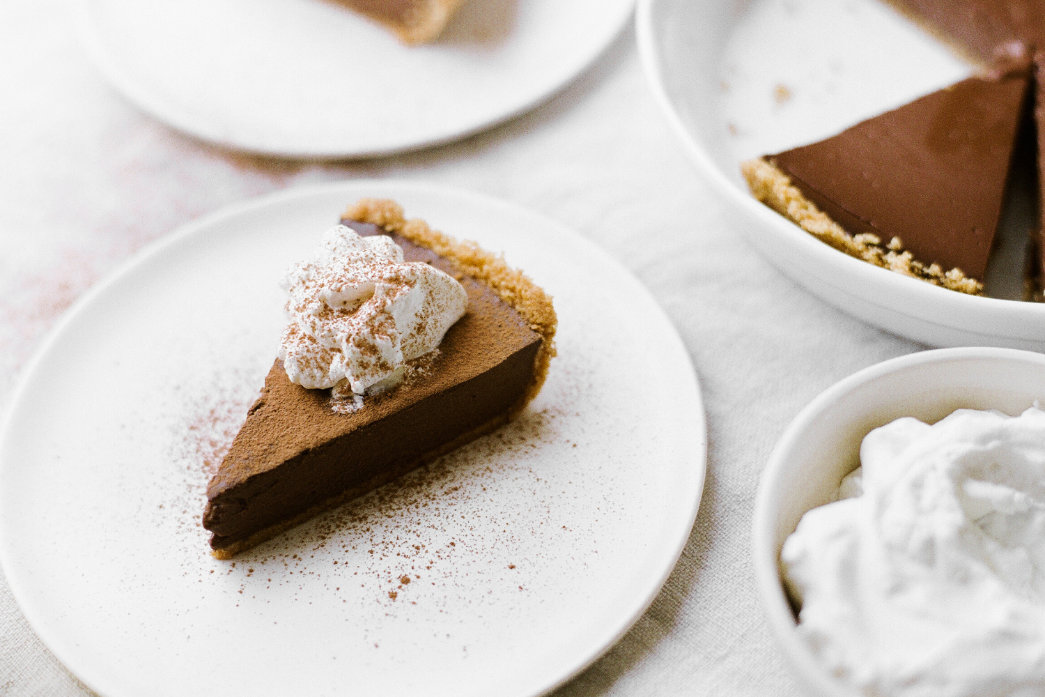 chocolate pudding pie slices on plates, ready to serve